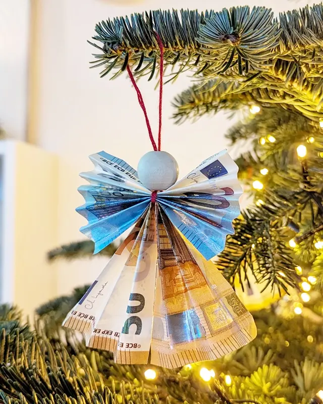Geldgeschenke zu Weihnachten - 4 kreative Faltideen - diy engel aus geldscheinen 1