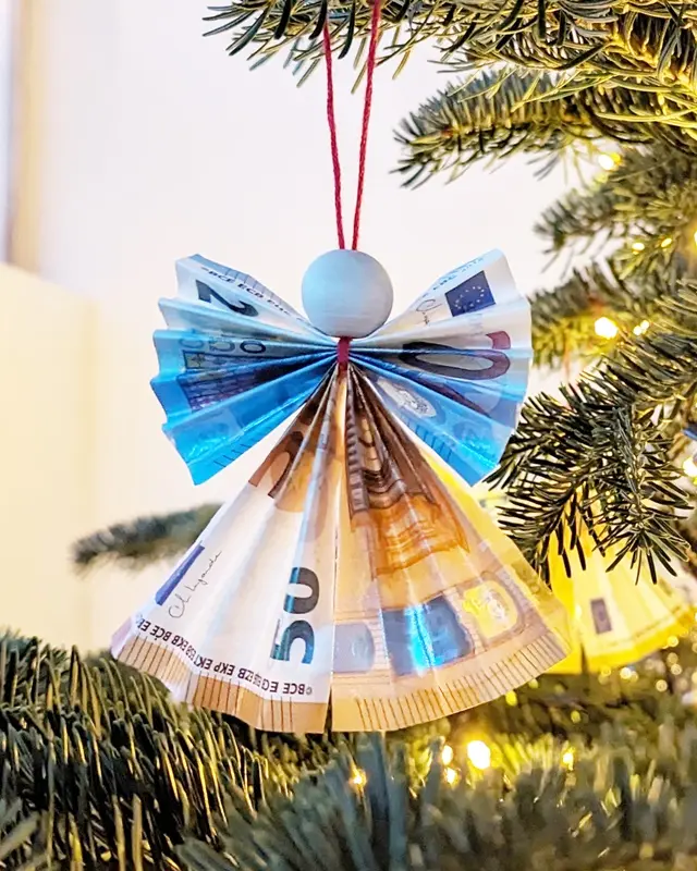Geldgeschenke zu Weihnachten - 4 kreative Faltideen - diy engel aus geldscheinen 4